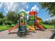 Colorful playground with multiple slides and play areas at 1017 Park Ridge Cir, Kissimmee, FL 34746