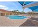 Community pool area with shaded seating and lounge chairs at 1017 Park Ridge Cir, Kissimmee, FL 34746