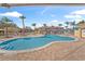 Community pool and surrounding patio area at 1017 Park Ridge Cir, Kissimmee, FL 34746