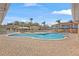 Relaxing kidney-shaped community pool with brick pavers at 1017 Park Ridge Cir, Kissimmee, FL 34746