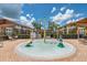 Community splash pad with colorful play features at 1017 Park Ridge Cir, Kissimmee, FL 34746