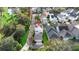 Aerial view of house with solar panels and neighborhood at 121 Longview Ave, Celebration, FL 34747