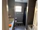 Clean bathroom with shower/tub combo and updated flooring at 1370 Fern Ln, Daytona Beach, FL 32117