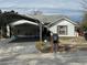 Single-story house with carport and mailbox at 1370 Fern Ln, Daytona Beach, FL 32117