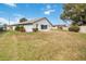 Backyard view of the house, showcasing its exterior at 1403 Sean Ct, St Cloud, FL 34772