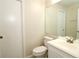 Clean bathroom with white vanity and a large mirror at 14764 Laguna Beach Cir, Orlando, FL 32824