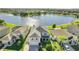 Two-story house with lake view and fenced backyard at 14962 Waterford Chase Pkwy, Orlando, FL 32828