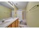 Bright bathroom with double sinks and tub at 14962 Waterford Chase Pkwy, Orlando, FL 32828