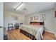 Large bedroom with wood floors, neutral walls, and a king-size bed at 14962 Waterford Chase Pkwy, Orlando, FL 32828