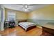 Charming bedroom with a desk and a bed at 14962 Waterford Chase Pkwy, Orlando, FL 32828