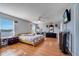 Primary bedroom with lake view and large bed at 14962 Waterford Chase Pkwy, Orlando, FL 32828