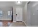 Interior entryway with door and wood flooring at 14962 Waterford Chase Pkwy, Orlando, FL 32828