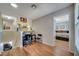 Upstairs hallway with wood floors and access to bedrooms at 14962 Waterford Chase Pkwy, Orlando, FL 32828
