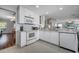 Bright kitchen with white cabinets, granite countertops, and stainless steel appliances at 14962 Waterford Chase Pkwy, Orlando, FL 32828