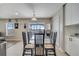 Kitchen features breakfast nook with glass table and pool view at 14962 Waterford Chase Pkwy, Orlando, FL 32828
