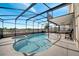 Irregular shaped pool with screen enclosure at 14962 Waterford Chase Pkwy, Orlando, FL 32828