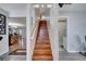 Wooden staircase leading to upper level at 14962 Waterford Chase Pkwy, Orlando, FL 32828