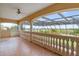 Screened balcony overlooking tranquil lake views at 1515 Sunset Pointe Pl, Kissimmee, FL 34744