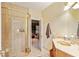 Elegant bathroom with shower and updated vanity at 1515 Sunset Pointe Pl, Kissimmee, FL 34744