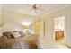 Comfortable bedroom with ensuite bathroom access at 1515 Sunset Pointe Pl, Kissimmee, FL 34744
