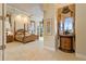 Spacious main bedroom with a large four-poster bed and plenty of natural light at 1515 Sunset Pointe Pl, Kissimmee, FL 34744