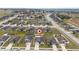 Aerial view showing a house with a pool in a neighborhood at 1606 Steely Dr, Dundee, FL 33838