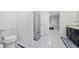 Clean bathroom with shower, toilet and vanity at 1606 Steely Dr, Dundee, FL 33838