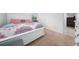 Primary bedroom with a queen-size bed and carpeted floor at 1606 Steely Dr, Dundee, FL 33838