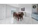 Dining room with wood table and six chairs at 1606 Steely Dr, Dundee, FL 33838