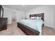 Main bedroom with king-size bed and walk-in closet at 1606 Steely Dr, Dundee, FL 33838