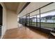 Spacious screened porch with tiled floor and backyard access at 1606 Steely Dr, Dundee, FL 33838