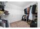 Large walk-in closet with ample shelving and hanging space at 1606 Steely Dr, Dundee, FL 33838
