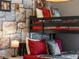 Bedroom with a bunk bed, a full size bed, and a Harry Potter theme at 1607 Kona Ln, Davenport, FL 33897