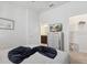 Spacious bedroom with walk in closet, an ensuite bathroom and neutral color palette at 1607 Kona Ln, Davenport, FL 33897
