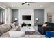 Bright living room featuring stylish furnishings and a contemporary design at 1607 Kona Ln, Davenport, FL 33897