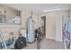 Storage room with water heater and other utilities at 1710 W Virginia Dr, Kissimmee, FL 34744