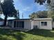 Home exterior showcasing deck and sliding glass doors at 2009 S Osceola Ave, Orlando, FL 32806