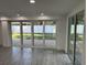 Finished basement with sliding glass doors leading to backyard at 2009 S Osceola Ave, Orlando, FL 32806