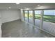 Bright finished basement with sliding glass doors leading to a deck at 2009 S Osceola Ave, Orlando, FL 32806