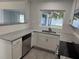 Modern kitchen with stainless steel appliances and granite countertops at 2009 S Osceola Ave, Orlando, FL 32806