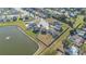 Aerial view highlighting the property's location near a lake and within a residential neighborhood at 2211 Bittle Way, St Cloud, FL 34769