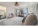 Bedroom with ample light, neutral colors, and a view to the bathroom at 2211 Bittle Way, St Cloud, FL 34769
