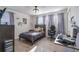 Comfortable bedroom with a large desk area and natural lighting at 2211 Bittle Way, St Cloud, FL 34769