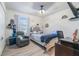 Bright bedroom with a desk and a comfy gray rocking chair at 2211 Bittle Way, St Cloud, FL 34769