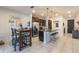 Modern kitchen with island seating and stainless steel appliances at 2211 Bittle Way, St Cloud, FL 34769