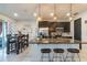 Eat-in kitchen with dark cabinets and granite countertops at 2211 Bittle Way, St Cloud, FL 34769