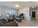 Living room with large windows, modern lighting, and vinyl floors at 2211 Bittle Way, St Cloud, FL 34769