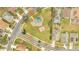 An aerial view showcasing a neighborhood park and surrounding homes at 2318 Andrews Valley Dr, Kissimmee, FL 34758