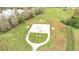 Aerial view of a community basketball court with benches at 2318 Andrews Valley Dr, Kissimmee, FL 34758