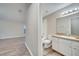Clean bathroom with white vanity and a shower/tub combo at 2318 Andrews Valley Dr, Kissimmee, FL 34758